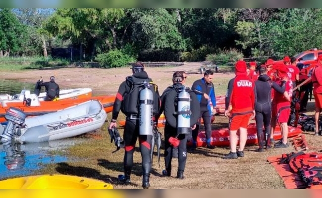 Por tierra y aire, se reanudó la búsqueda del turista que cayó al lago de Embalse